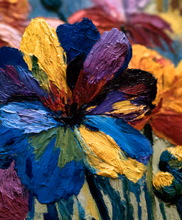 a close-up of van gogh's palette knife, showing the thick and textured strokes that give depth to his floral work